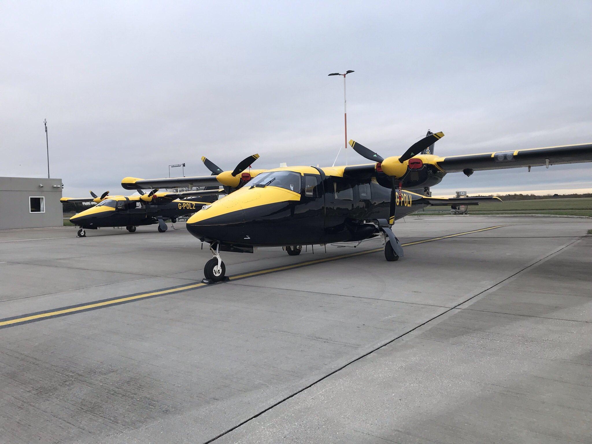 Two police aeroplanes on the runway at Doncaster Sheffield Airport
