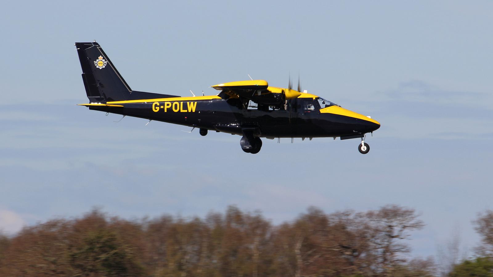 A police aeroplane coming down to land