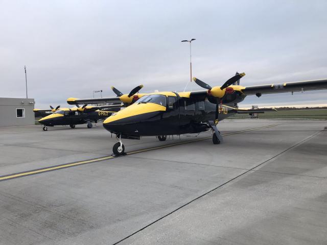 Two police aeroplanes on the runway at Doncaster Sheffield Airport