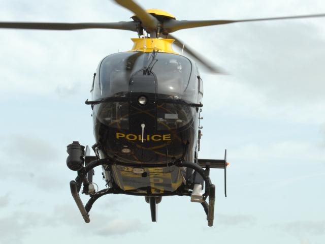 Police helicopter in flight