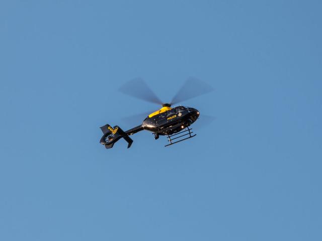 Helicopter in flight