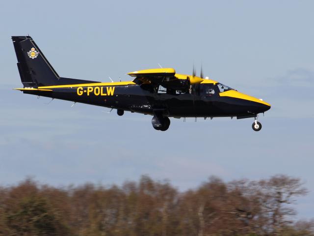 A police aeroplane coming down to land